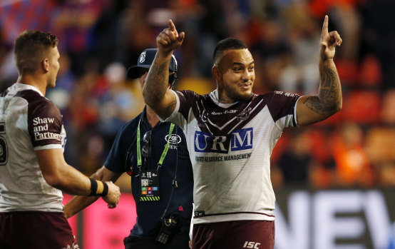 Read 'em and weep: Addin Fonua-Blake eggs on the crowd after scoring against Newcastle.