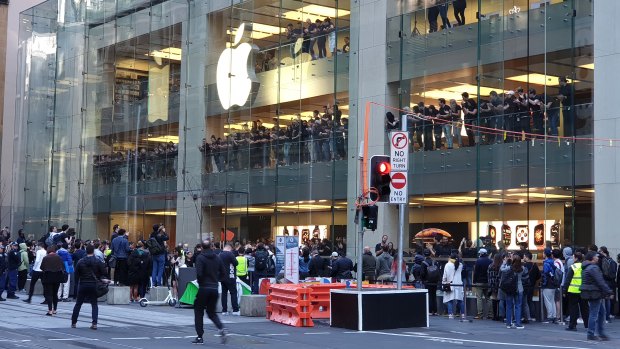 A small crowd of Apple fans queued early on Friday to get the new iPhone.
