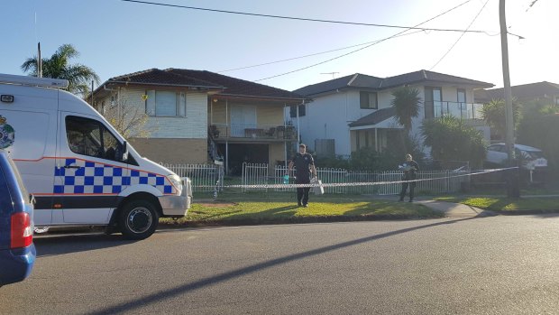 Police attend a crime scene at Wishart Road, Upper Mount Gravatt, in southern Brisbane after a woman was found dead at the address.