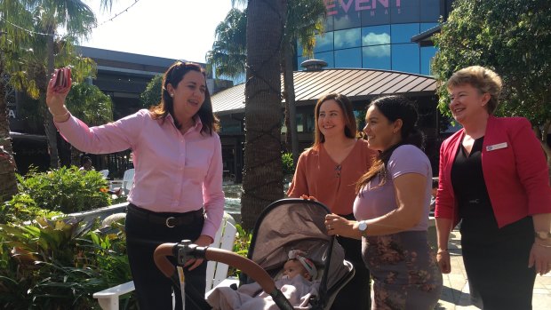 Premier Annastacia Palaszczuk takes selfies with Garden City shoppers.