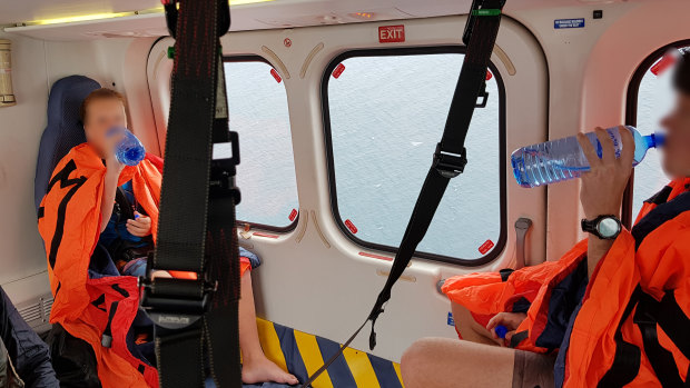 The two boys - aged 12 and 18 - are safe after being rescued 7km off the Ningaloo coast.