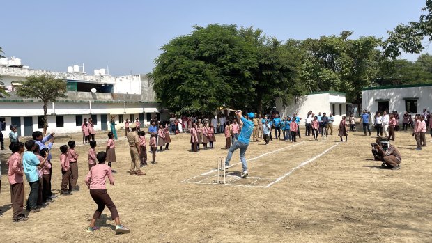 Pat Cummins in his element at a school in Lucknow.