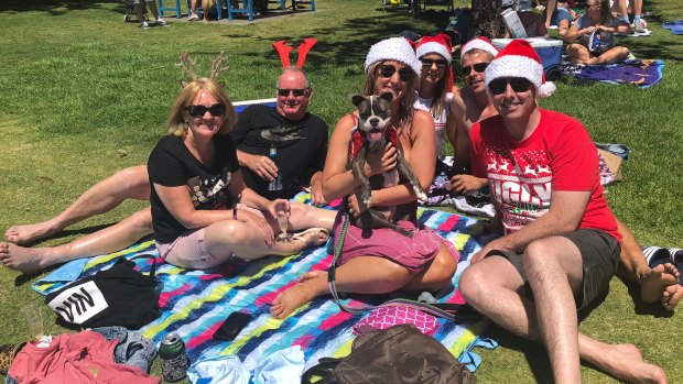 Sam Joy, 34, (third from left) brought her UK parents to sunny Sydney for their first hot Christmas.