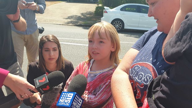 Sarah Boyle and her daughter Chelsea who wanted to leave a stuffed toy so the two girls would know they were loved.