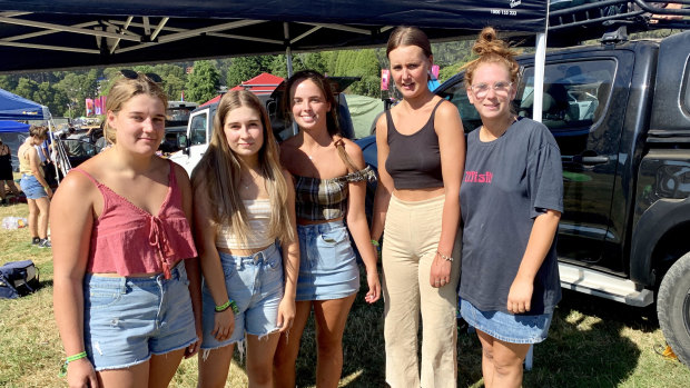 Festival-goers Emma Hoggson, Jade Rudiger, Monique Nicol, Kate Relf, Taylor Golding getting ready to pack up  their tents.