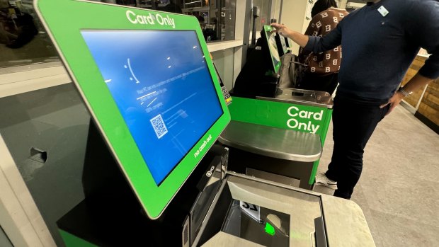 A Woolworths checkout in Sydney shows a dead screen during the CrowdStrike outage.
