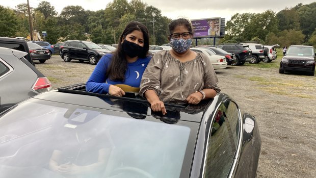 Biden supporters Natasha and Shailaja Singh at a Biden rally in Atlanta.