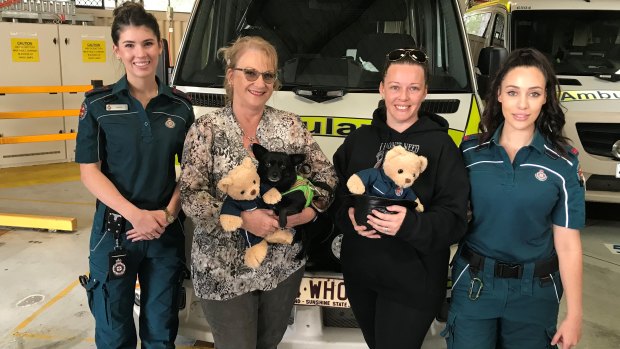 Queensland paramedics with Ron McCartney’s family. Left to right: Hanna Hoswell, Sharon McCartney, Danielle Smith and Kate Hanafy.