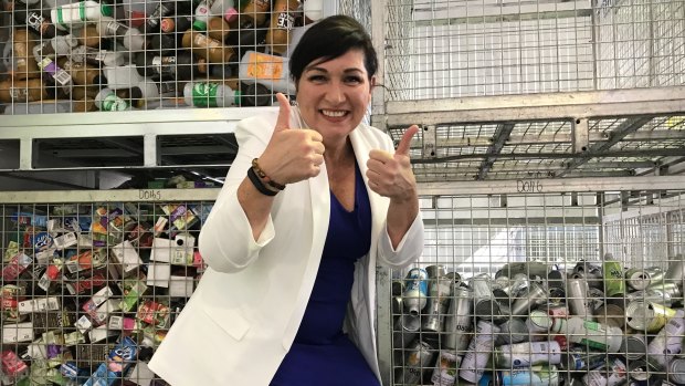 Environment Minister Leeanne Enoch gives Queenslanders the thumbs up for accepting container recycling.
