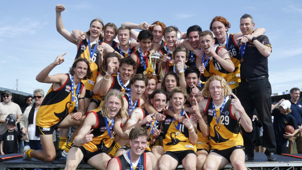 Dandenong Stingrays celebrate their TAC Cup victory.
