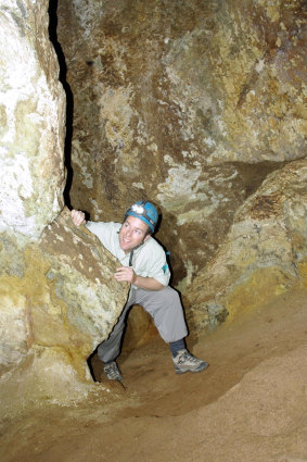 Tim the Yowie Man explores the Cotter Cave.