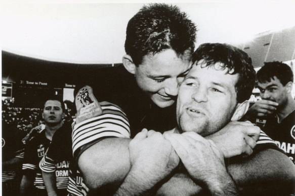 Two tries and a grand final win in his last game of Rugby League... an elated Royce Simmons is embraced by Mark Geyer at full-time on September 22, 1991.