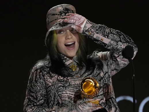 Billie Eilish reacts as she accepts the award for record of the year for Everything I Wanted at the Grammys.
