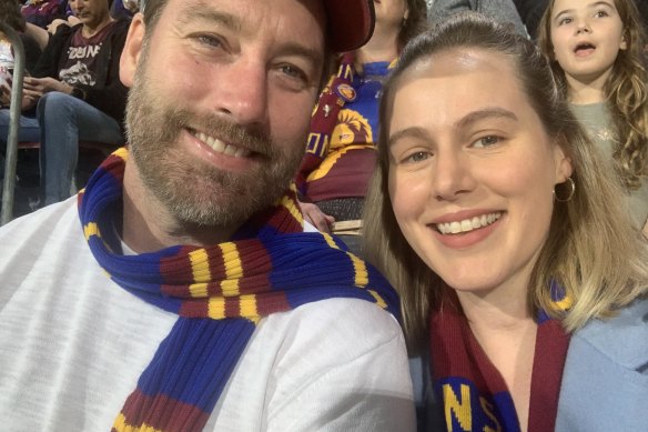 Zach and his wife, Steph, show their colours at the Gabba.