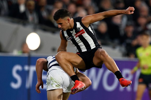 Nick Daicos and Tom Atkins compete for the Sherrin.
