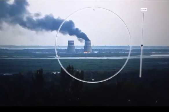 An image provided by the Ukrainian presidential press office showing smoke rising from a cooling tower of the Zaporizhzhia nuclear power station.