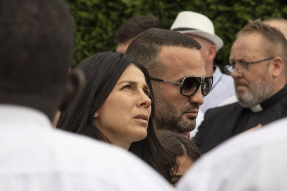 Leila and Danny Abdallah at the funeral of three of their six children.