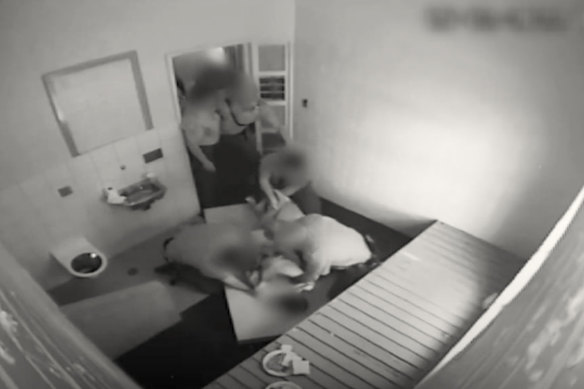 Vision from inside Banksia Hill Detention Centre where officers use a technique known as ‘folding up’ to restrain a detainee shocked viewers.