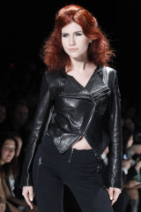 Anna Chapman, who was deported from the U.S. on charges of espionage, displays a creations by I Love Fashion.