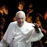 Pope Francis waves to the crowd during a parade in Philadelphia on September 26, 2015.