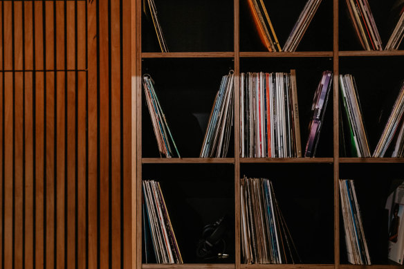 Timber shelves already stacked
with 500 vinyl records will soon groan under the weight of more. 