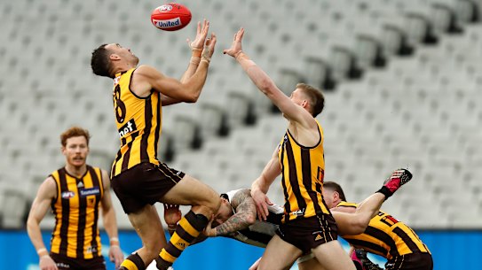 MELBOURNE, AUSTRALIA - AUGUST 08: Jonathon Ceglar of the Hawks runs back with flight of the ball in an attempt to mark during the round 21 AFL match between Hawthorn Hawks and Collingwood Magpies at the Melbourne Cricket Ground on August 08, 2021 in Melbourne, Australia. (Photo by Darrian Traynor/AFL Photos/via Getty Images)