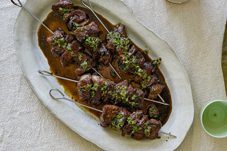 The black vinegar sauce on these Sichuan-style cumin and lamb skewers also serves as a glaze.