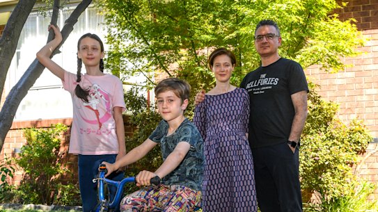 Melbourne couple Mary Brennand and Rob Citroni, with their children Katia, 11, and Reuben, 8, are torn about the return to school.