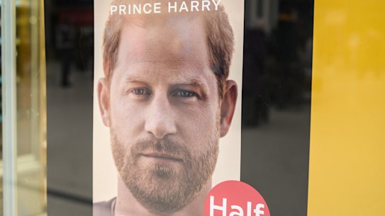 A poster advertising the launch of Prince Harry’s memoir “Spare” in a store window in London, England.