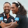 Jarome Luai shares a joke with Tigers coach Benji Marshall.