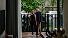 New homeowners John Le and Annabelle Camer in their Rosebery apartment. The couple are looking forward to making the most of their street facing balcony.