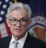 Fed announces smaller rate hike but signals more to come