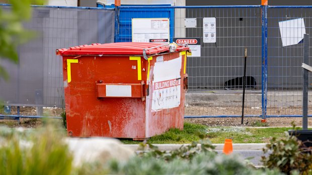 Stock image of skip bin in front of house in Australian suburb. Picture: Adobe Stock