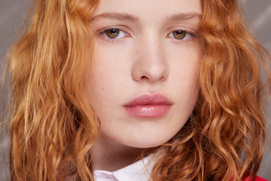 Using a smoothing hair mask after showering and before styling can help lock in moisture. 