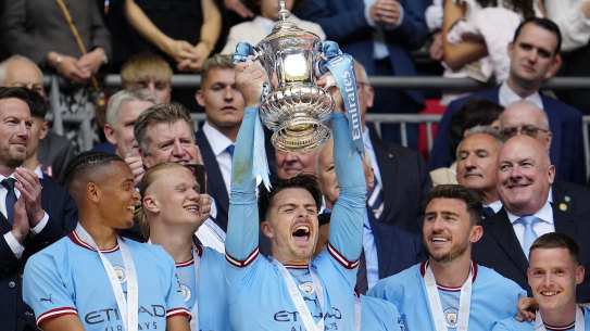 Man City celebrate FA cup win. 