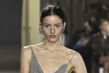 See-through embellished slip dresses harked back to early 90s grunge at Albus Lumen’s Monday fashion week show. 