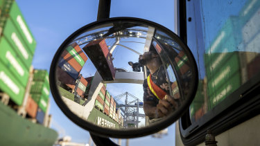 Shipping containers bound for China are loaded in Savannah, Georgia. World trade was again thrown into chaos after Donald Trump's tweeted threats.