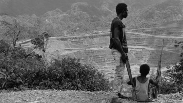 Rebel guerillas above the Panguna copper and gold mine in Bougainville in 1994.