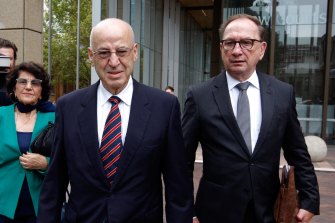 Former Labor minister Eddie Obeid (centre) arrives at the NSW Supreme Court, accompanied by his wife Judy and his solicitor Michael Bowe.