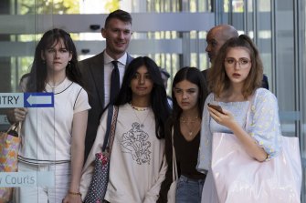 The young activists leave court after the Federal Court dismissed their climate case. From left to right: Luca Saunders, Anj Sharma, Izzy Raj-Seppings and Ava Princi.