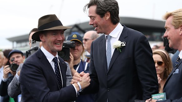 Gil McLachlan congratulates trainer Ciaron Maher after Bella Nipotina’s win in The Everest.