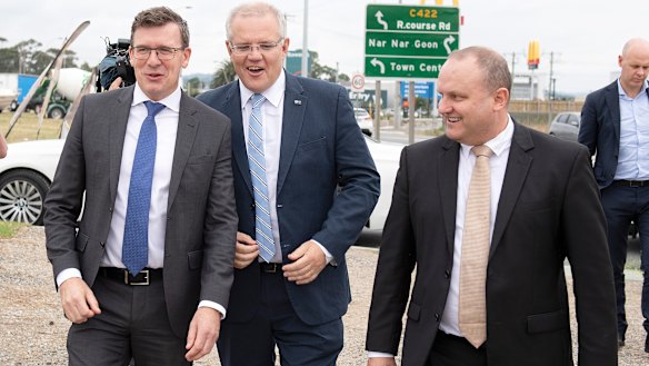 Scott Morrison (centre) with Alan Tudge (left) and Jason Wood (right) at an infrastructure announcement ahead of last year's federal election.