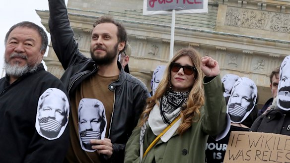 Chinese artist Ai Weiwei, left, at a demonstration in Berlin last month against extradition of Julian Assange to the US.