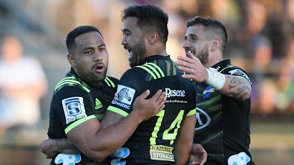 Ngani Laumape, left, scored a hat-trick and terrorised Brumbies defenders.
