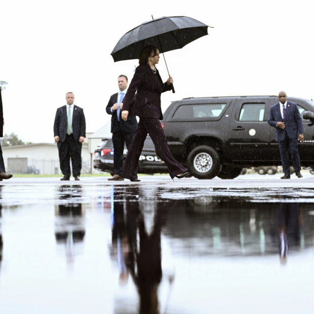 Vice President Kamala Harris boards Air Force Two as she departs from Ellington Airport in Houston.