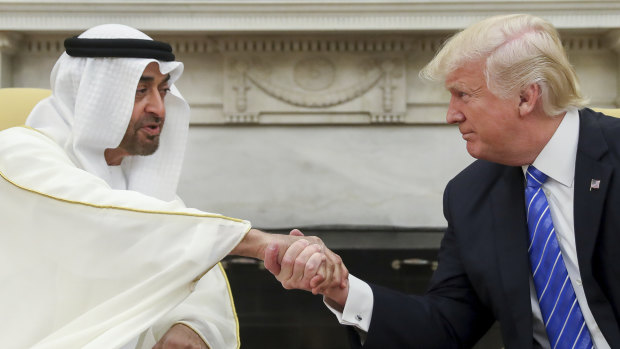 US President Donald Trump shakes hands with Abu Dhabi’s crown prince, Sheikh Mohammed bin Zayed al-Nahyan, in the White House in Washington in 2017.