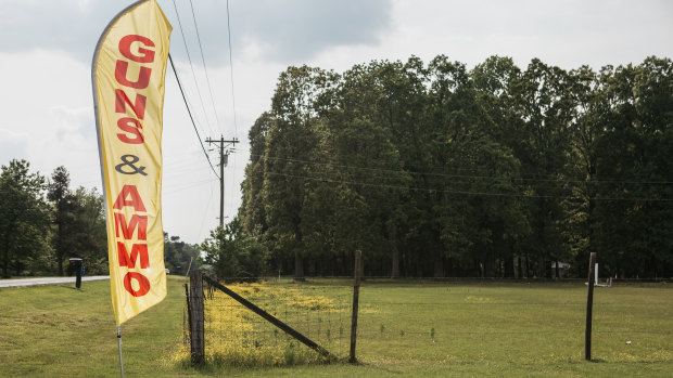 A roadside banner outside Personal Security Firearms in Benton, Kentucky.