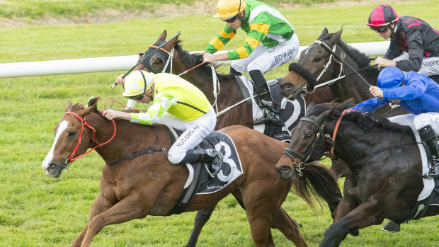 Eduardo charges away with the July Sprint on a slow track at Rosehill.
