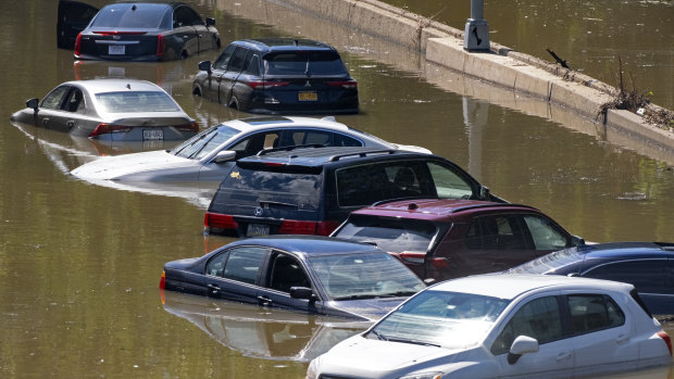 Cars are stranded by high water on the Major Deegan Expressway in the Bronx.