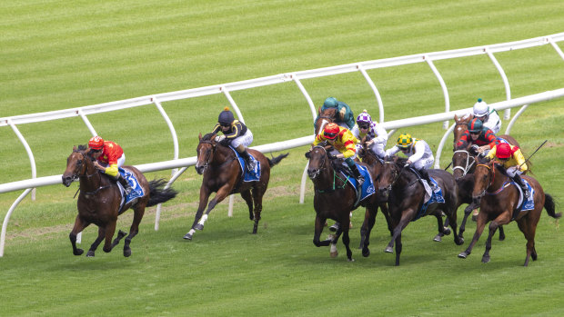 Nash Rawiller guides Rulership over the line  at Randwick yesterday.